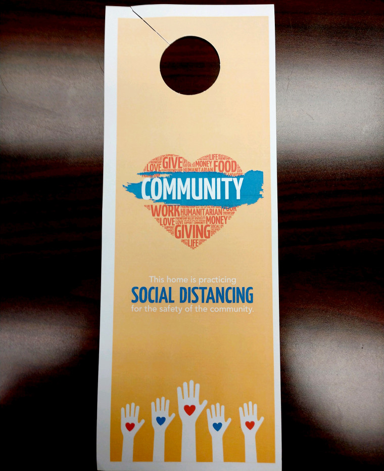 Starr County officials created and distributed door hangers to encourage social distancing.
