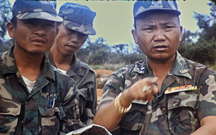 Tou Long Yang, left, and General Vang Pao of the Royal Lao Army, right, at the Plain of Jars in 1971.