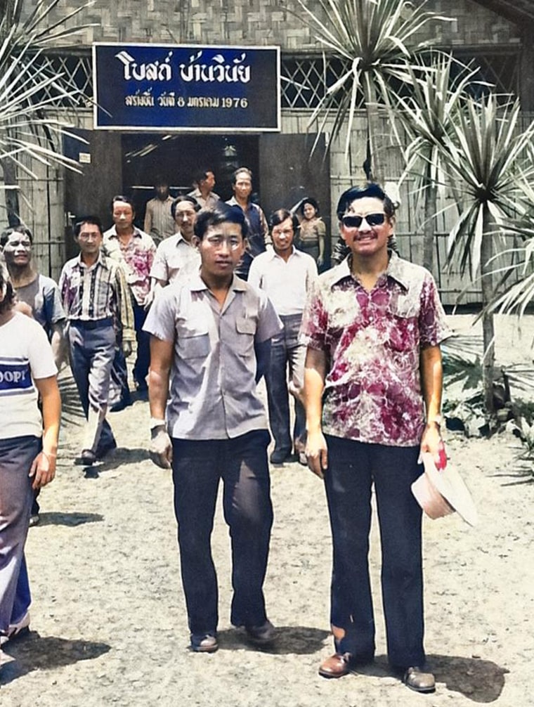 Tou Long Yang, right, at the Ban Vinai Refugee Camp in Thailand in 1976.