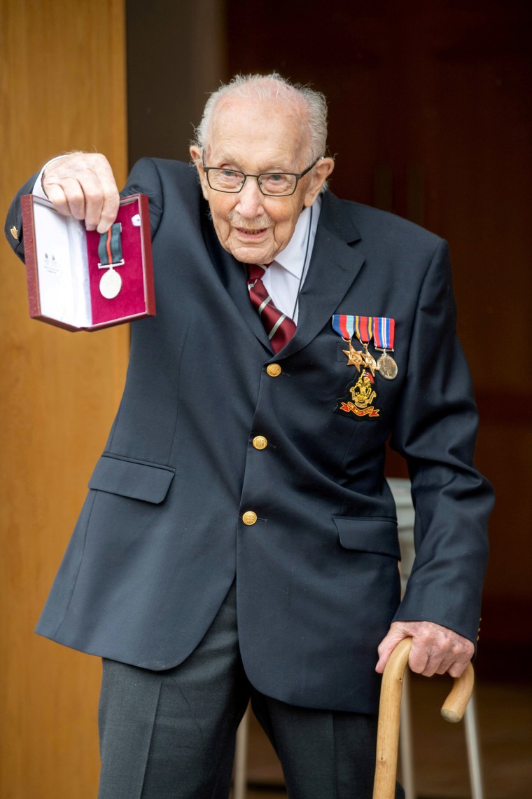 Image: Former British Army Officer Captain Tom Moore, appointed the first Honorary Colonel of the Army Foundation College in Harrogate, holds his Yorkshire Regiment Medal in Bedford