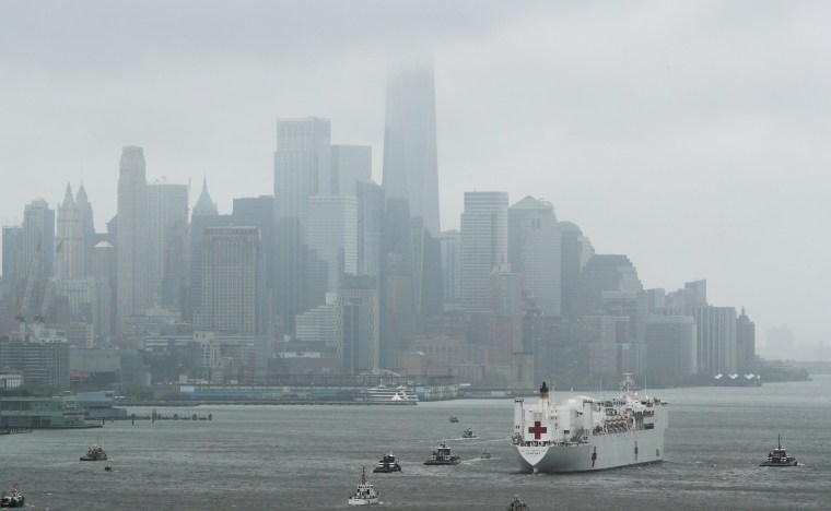 Image: Hospital ship USNS Comfort departs Manhattan during the outbreak of coronavirus disease (COVID-19) in New York