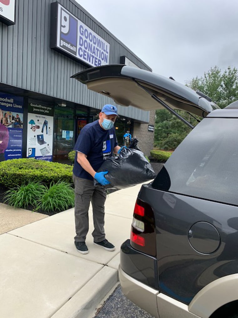 Goodwill employees wear masks and gloves and sometimes remove donations directly from people's cars to avoid contact.