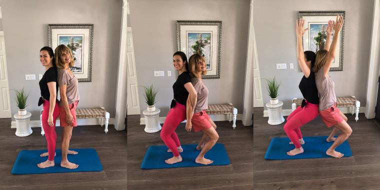 Couple Practicing Yoga Standing In Ushtrasana Position Free Stock Photo and  Image 135665552