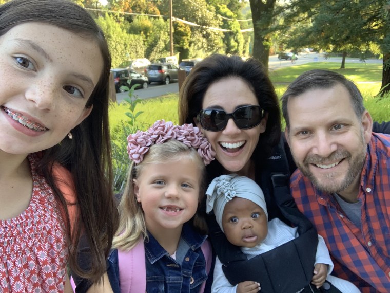 Parents Courtney and Russell Earl adopted Magnolia last year, making it three girls in the family alongside Whitney (left), 12, and Charlotte, 8, at their California home. 