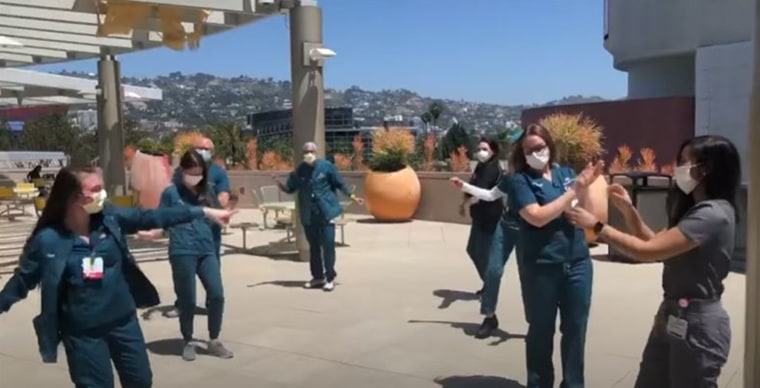 Healthcare workers danced in the video wearing uniforms and masks.