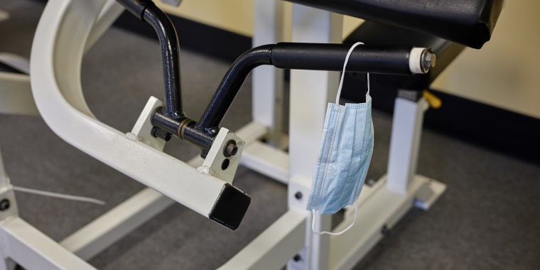 Surgical Mask Hanging on Weight Equipment