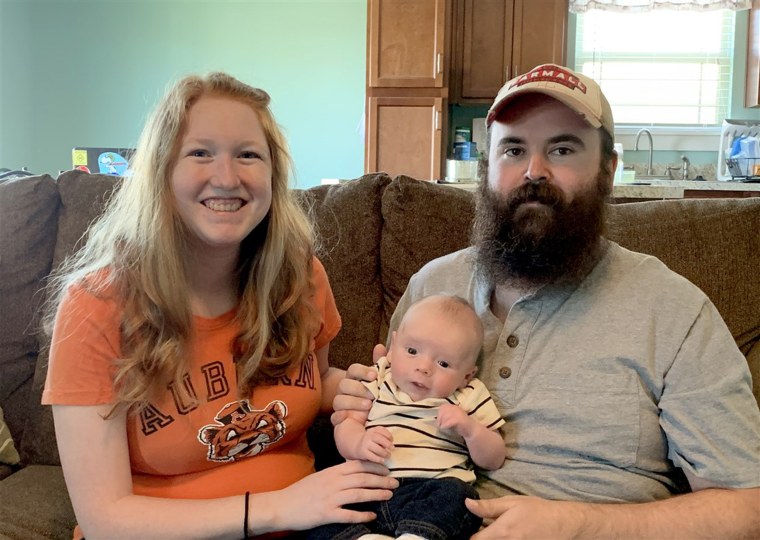 Mariel and Josh Prince with their son, Declan. Josh's father personally delivers roses whenever there is a new baby in the family, a tradition started by his father; because of social distancing, he could not do that to welcome Declan, and had to order some from a local florist instead.