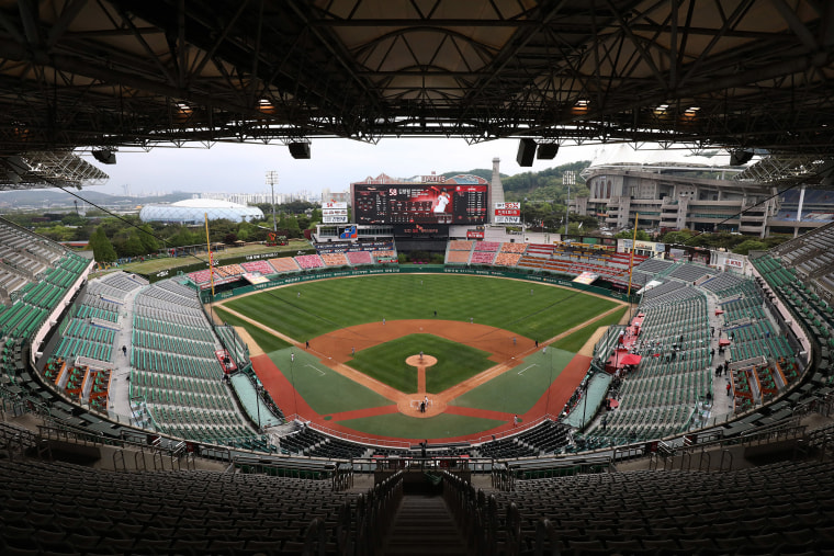 Image: The Korean Baseball Organization League played its opening game between SK Wyverns and Hanwha Eagles in an empty ballpark in Incheon, South Korea on Tuesday.