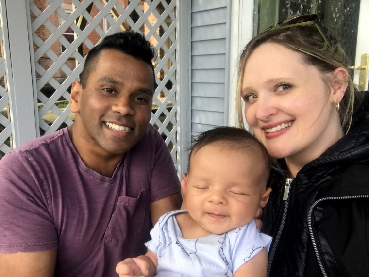 Lindsay Preseau with her husband, Ritwik Banerji, and son, Ludo. When she went into labor, lockdowns and other measures were being implemented. "By the time I had the baby, it was like end-of-the-world panic."