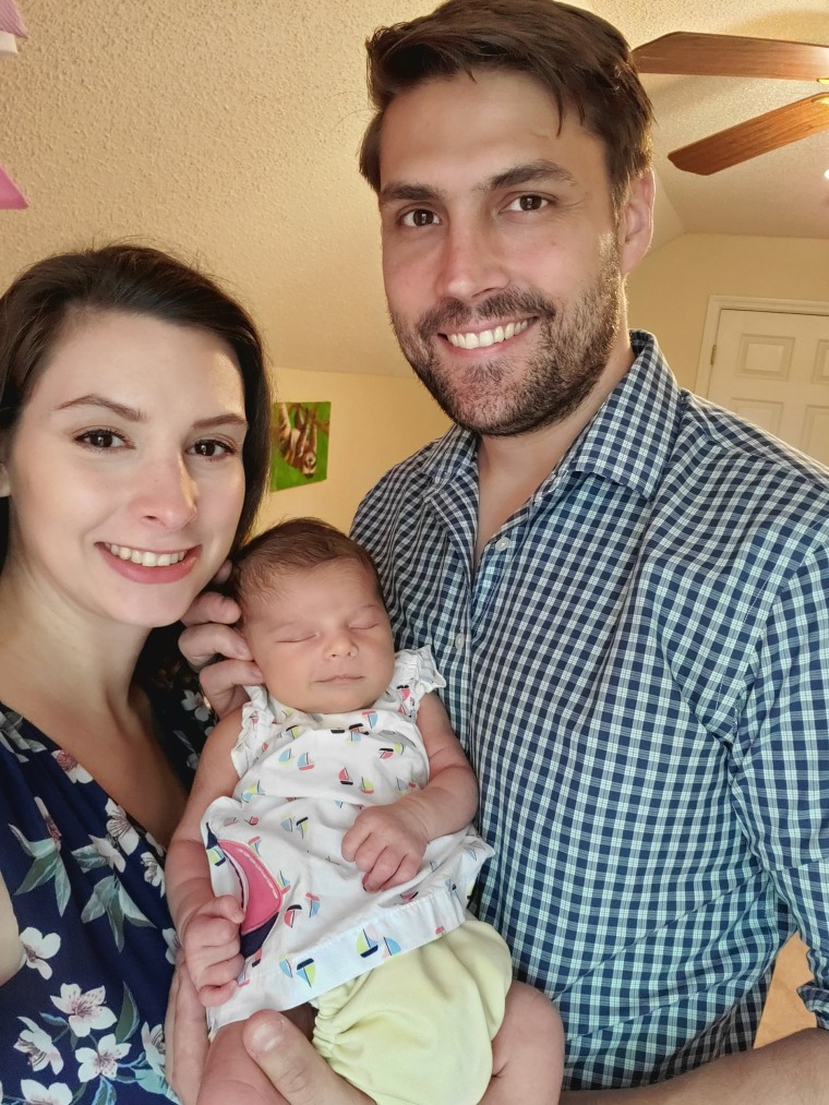 "We made it through a baby shower; I know a lot of women are now not able to do that," said Brittany Culbertson, seen with her husband, Craig, and daughter, Gwen.