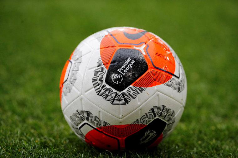 Image: The Premier League logo on a match ball before a match at Burnley FC.