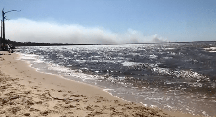 Image: Baghdad and Hurst Hammock wildfires burning on both sides of Pensacola Bay, Florida.
