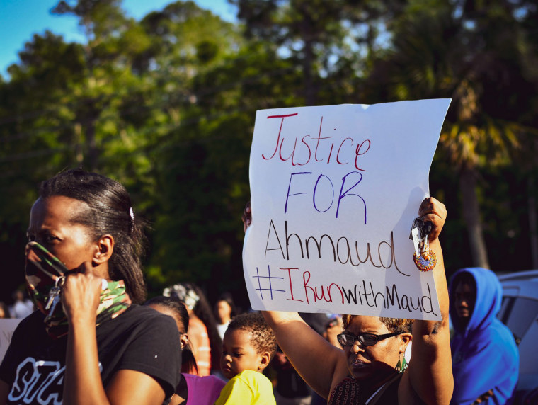 Protesters gather on May 5, 2020 in the area where Ahmaud Arbery was killed in Satilla Shores, Ga.