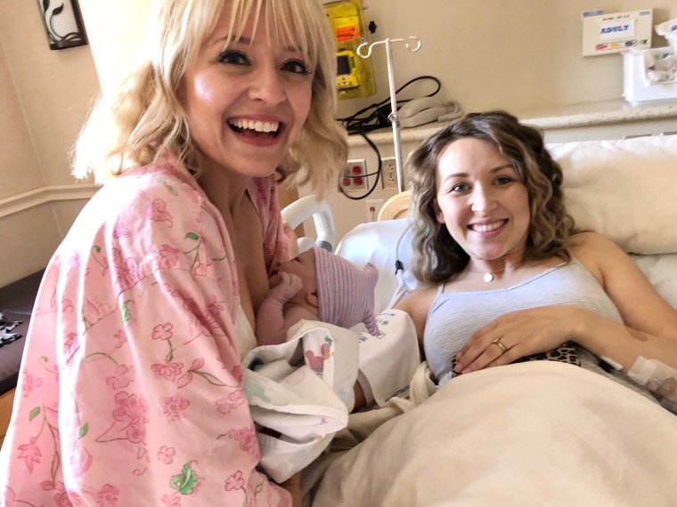 When gestational surrogate, Megan Blackhurst, was a week past her due date without any indications she might deliver soon, she and Kelsey Nixon decided a hospital birth would be safer than the home birth they planned on when the pandemic first hit. 