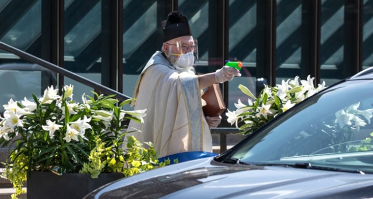 priest uses squirt gun