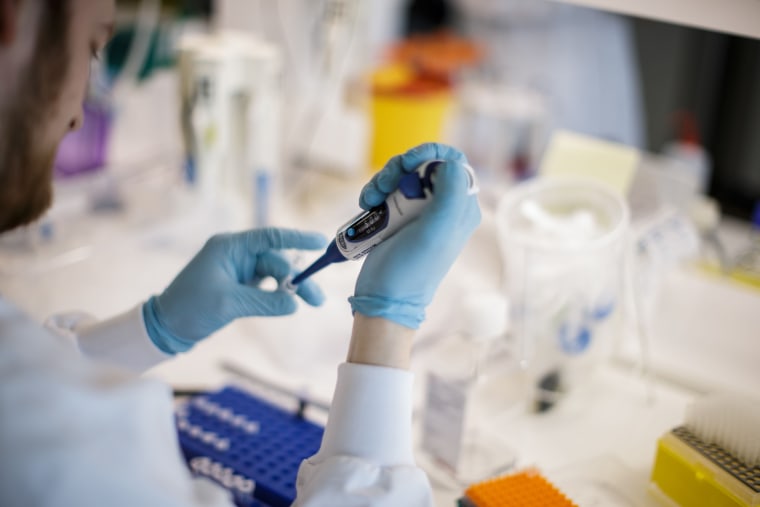 Image: A researcher works on a vaccine against the new coronavirus Covid-19 at the Copenhagen's University research lab in Copenhagen, Denmark, on March 23, 2020.