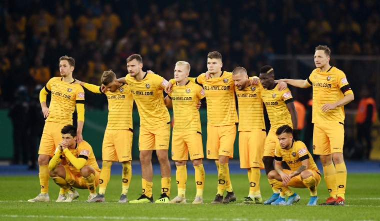 Image: Dynamo Dresden players during a penalty shootout.