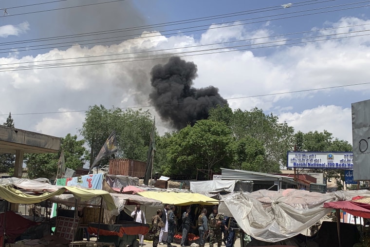 Image: Smokes rises from a hospital after a gunmen attacked in Kabul, Afghanistan