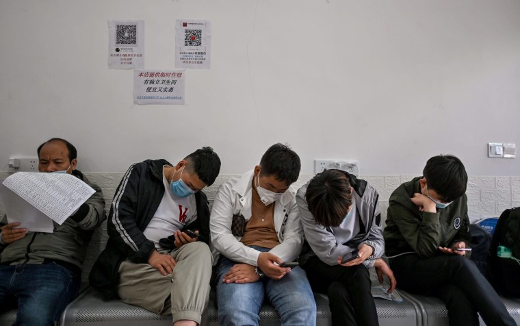 Image: Men in an employment agency in China