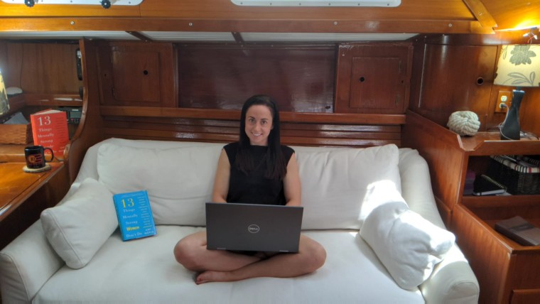 Amy Morin working on her sailboat during the COVID-19 quarantine.