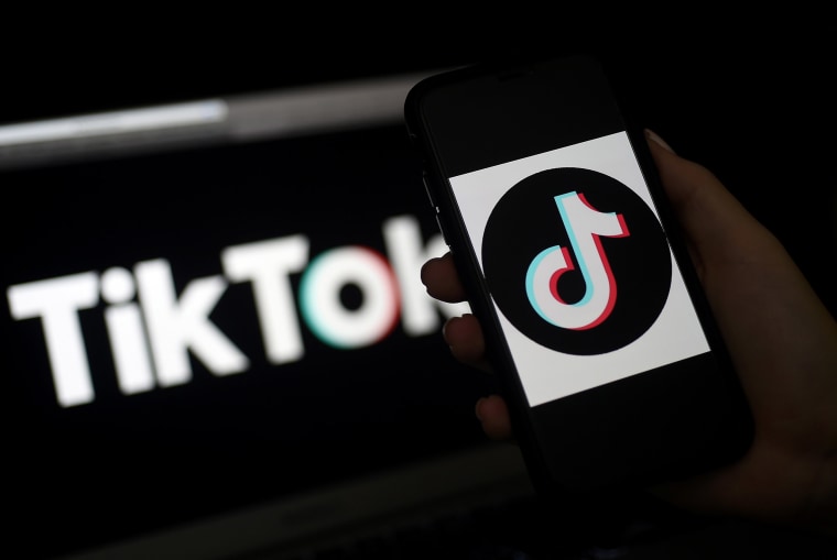 Image: The social media application logo, TikTok on the screen of an iPhone on April 13, 2020, in Arlington, Virginia.