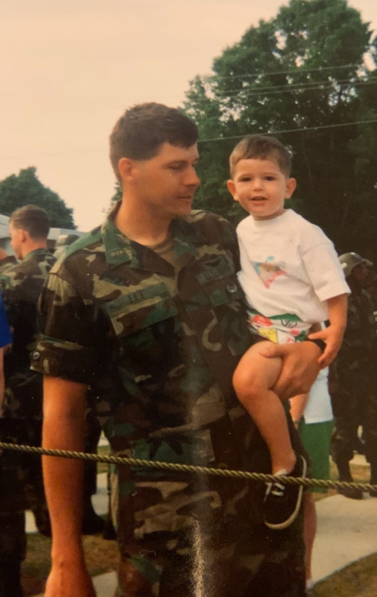 U.S. Army Capt. Donnie Lee holds his son, Nathaniel Lee, in the 1990s.