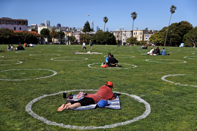 Image: Mission Dolores Park In San Francisco Encourages Social Distancing With Marked Circles