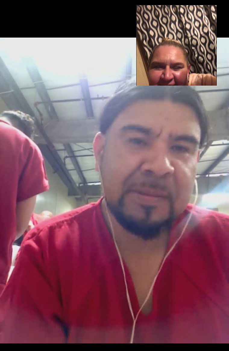 Betsy Mejia speaks to her husband Oscar Mejia in the Bluebonnet detention center over video call.