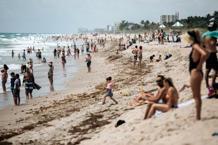 Image: People gather on Florida's Delray Beach ahead of the Memorial Day holiday on May 23, 2020.