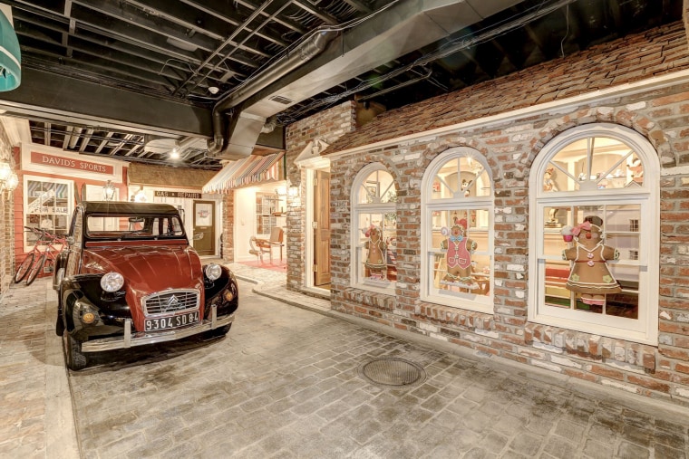 Fully functioning vintage cars decorate the cobblestone streets. 