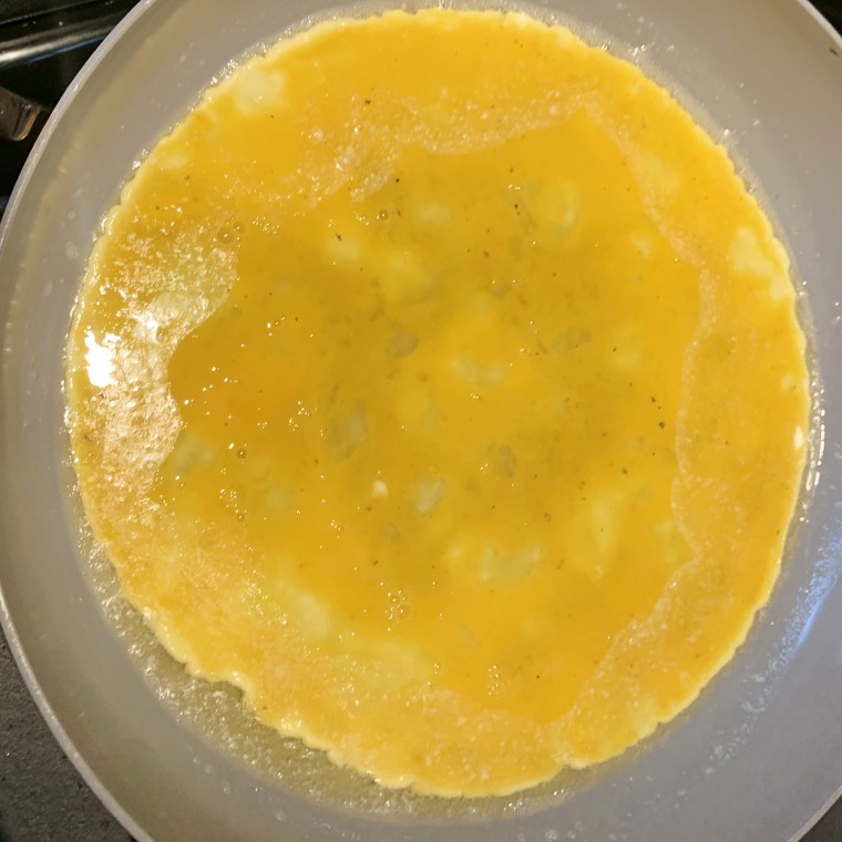 Let the eggs set in a skillet with a bit of butter for about a minute before adding the bread.