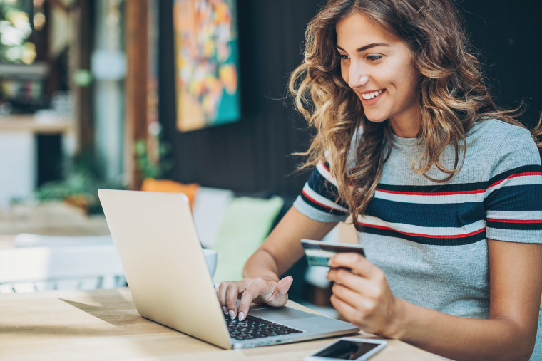 Young woman shopping on-line