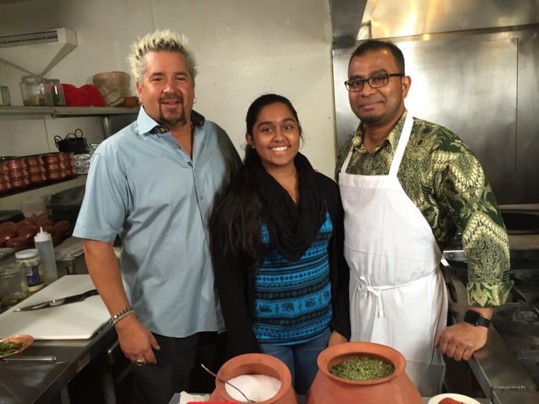 Guy Fieri, Hafsa and Ruhel Islam, when their restaurant was featured on "Diners, Drive-Ins and Dives."