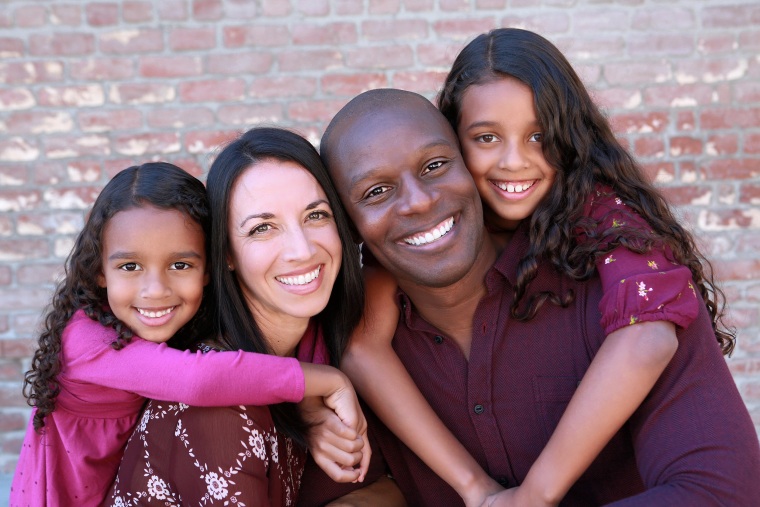 Shola Richards with his family.