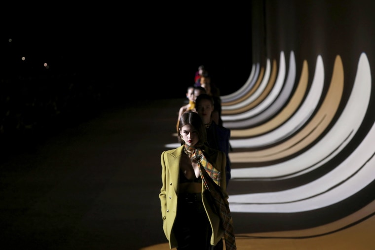Image: Kaia Gerber leads other models during the Saint Laurent fashion show in Paris on Feb. 25, 2020.