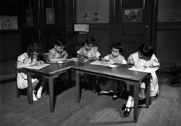 Image: Founded in 1891 as a public school, the building served generations of Italian and Chinese children, many of whom still live in the neighborhood today. Here, a Kindergarten art class met in June, 1935.