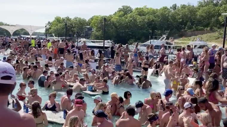 Image: Revelers celebrate Memorial Day weekend at Osage Beach of the Lake of the Ozarks, Missouri