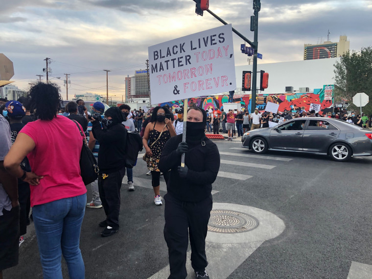 Protesters march in Container Park in Las Vegas on Saturday, May 30, 2020.