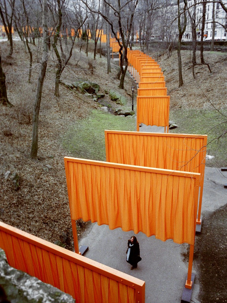 Image: A visitor walks through "The Gates" in Central Park in New York in 2005.