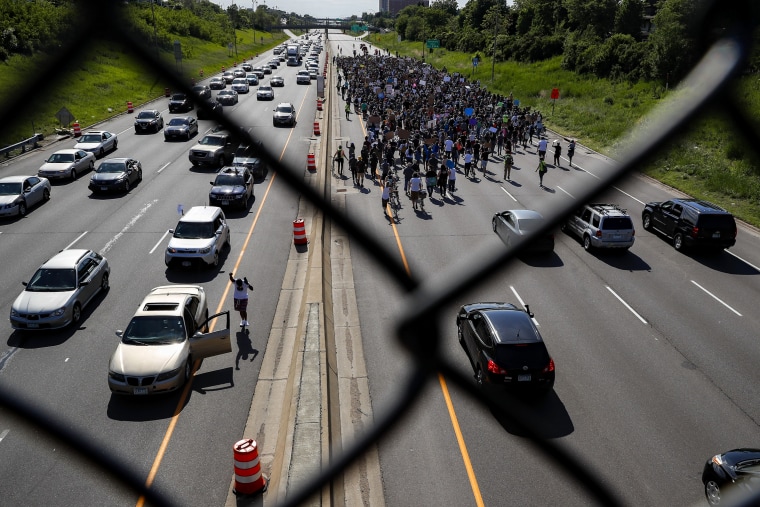 Image: Protesters march down Highway 94 in St. Paul, Minn., on May 31, 2020.