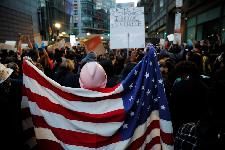 Protestors rally against the death in Minneapolis police custody of George Floyd in Boston