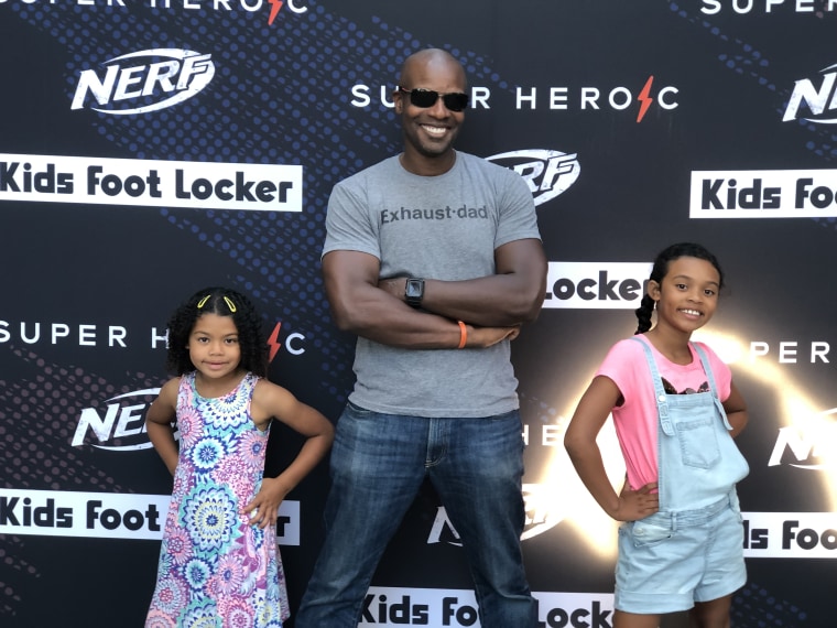 Author and speaker Doyin Richards with his daughters, ages 6 and 9.
