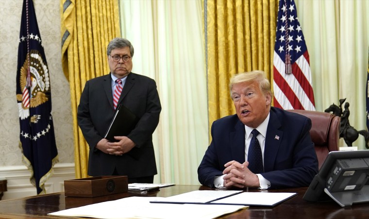 Image: President Donald Trump speaks before signing an executive order aimed at curbing protections for social media giants, in the Oval Office of the White House, Thursday, May 28, 2020, in Washington, as Attorney General William Barr listens.