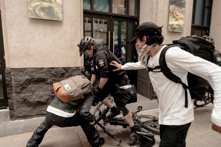 Police in downtown Seattle used physical force to detain a protester on May 31, 2020.