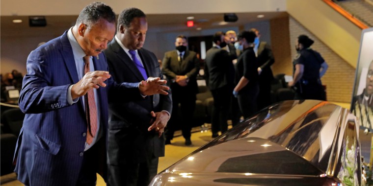 Image: Civil rights activist Reverend Jesse Jackson prays in front of George Floyd's coffin during a memorial service for George Floyd following his death in Minneapolis police custody, in Minneapolis