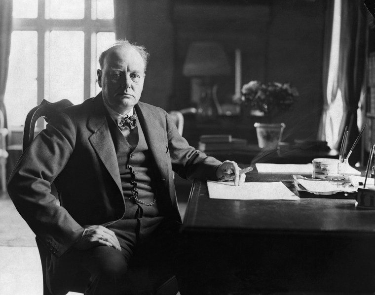 Image: The Conservative statesman and war-time leader Sir Winston Churchill (1874-1965) at his Kent home