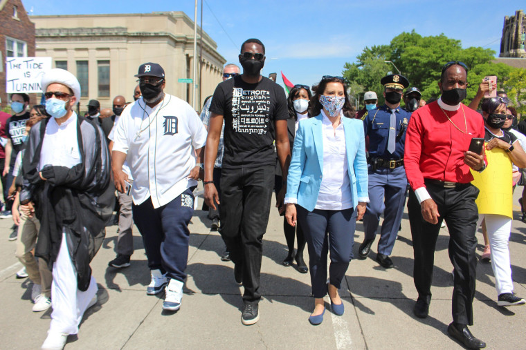 Gov. Gretchen Whitmer and Lt. Governor Garlin Gilchrist II participate in a march with clergy, community leaders, and local elected officials through Highland Park and Detroit on June 4, 2020.
