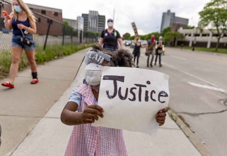 Laylah, 5, marches down Michigan Ave. on June 4, 2020 in Detroit.