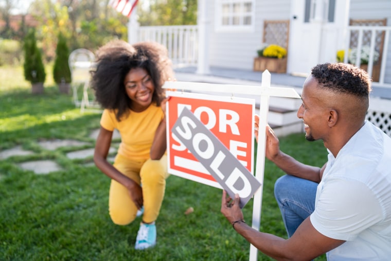 Young couple buying a new house