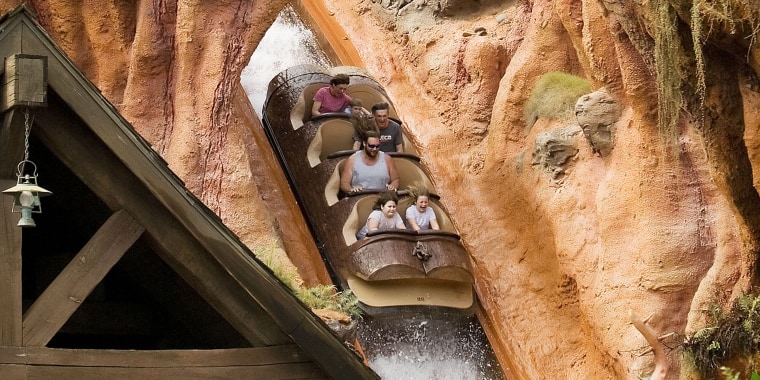 Guests ride on the Splash Mountain attraction at the Walt Di